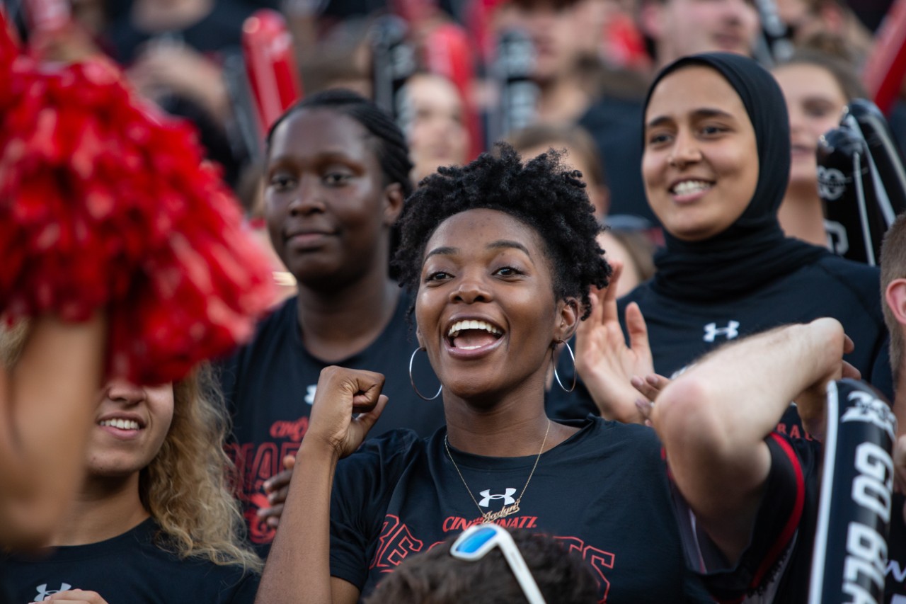 Students cheering at a football game